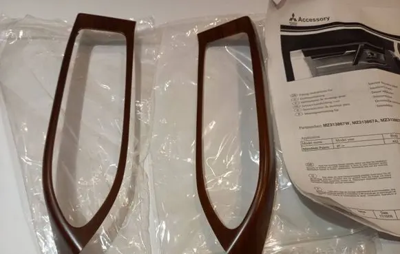 Mitsubishi Pajero Front door window switch trim MZ313867W