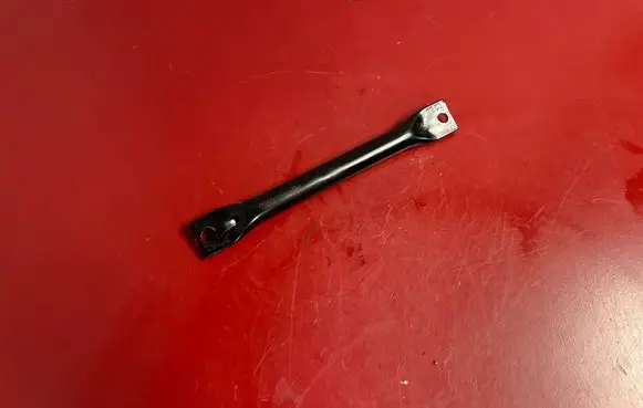 Radiator support slam panel bracket