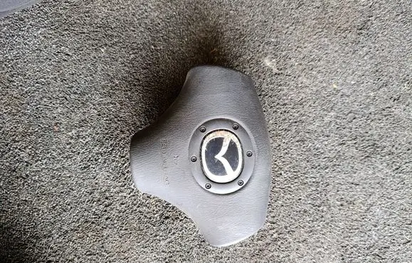 Mazda 323 F Steering wheel airbag B28V7K00