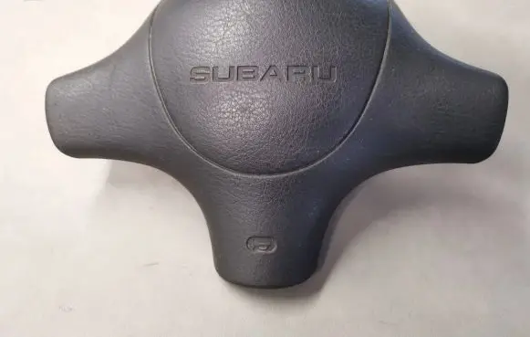 Subaru Impreza I Steering wheel trim 