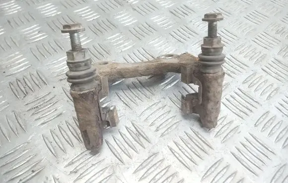 Renault Megane II Brake caliper pad carrier rear 