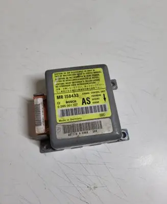 Mitsubishi Carisma Airbag control unit/module 0285001127 MR158433 95717840468