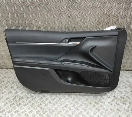 Toyota Camry VIII XV70 Front door card panel trim 67764X1414 74244X1403