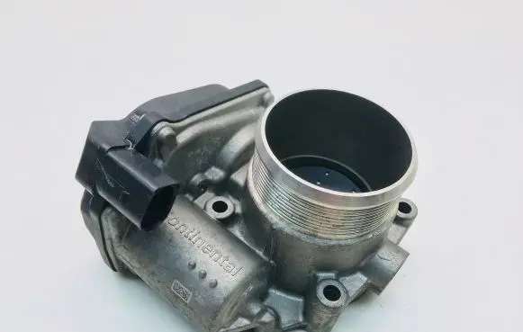 Volkswagen Golf V Throttle valve 06F133062Q A2C53390403