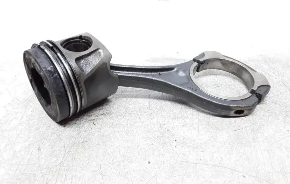 Piston with connecting rod