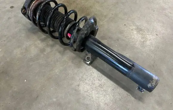 Volkswagen PASSAT B6 Front shock absorber with coil spring