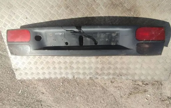 Renault Laguna I Trunk door license plate light bar 7703072198