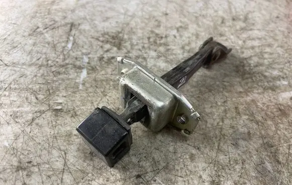 Mitsubishi Grandis Rear door check strap stopper