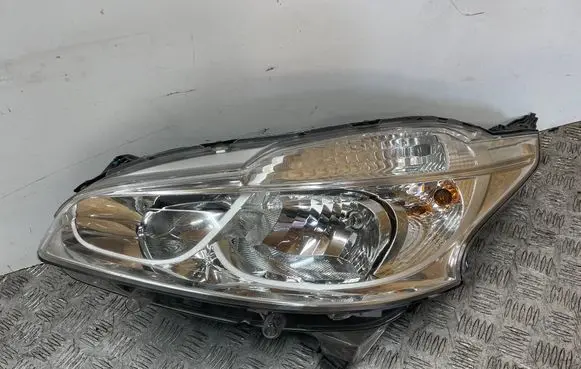 Peugeot 208 I Headlight/headlamp 9802221880