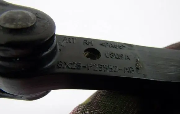 Jaguar XF Front door check strap stopper 8X23F23552AB