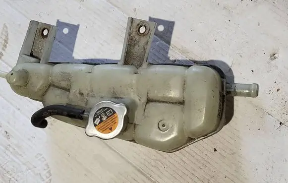 Nissan Note (E12) Coolant expansion tank/reservoir 217113VD1A