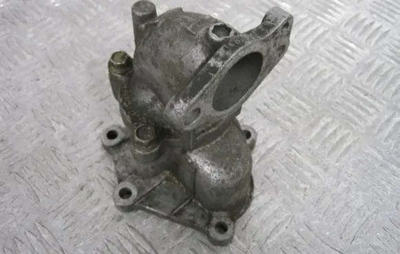 Nissan Primera Thermostat housing 038115