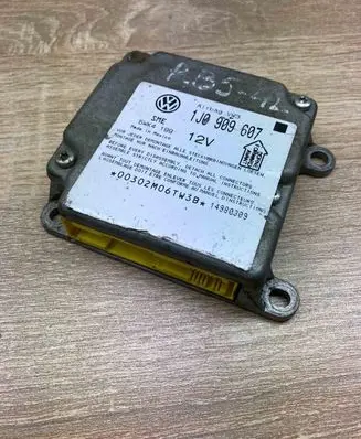 Volkswagen PASSAT B5 Airbag control unit/module 1J0909607 5WK4199