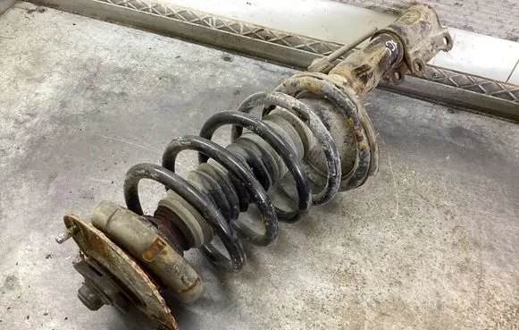 Volvo XC90 Front shock absorber with coil spring 30645515A 84904000041