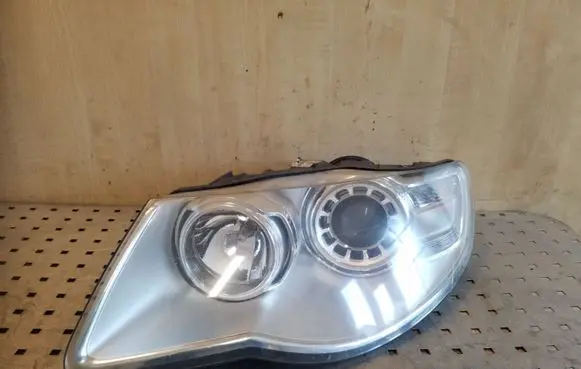 Volkswagen Touareg I Headlight/headlamp 7L6941031A 1LL24703203