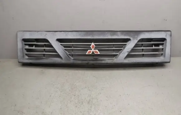 Mitsubishi Cordia Front bumper upper radiator grill MB396675
