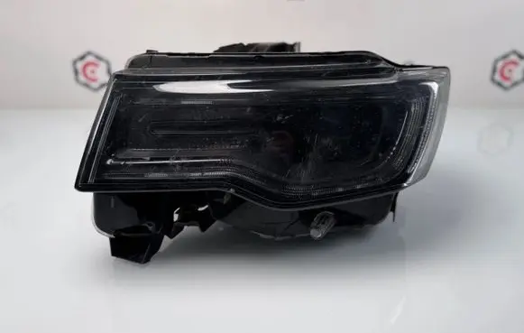 Jeep Grand Cherokee Headlight/headlamp 68266651AG