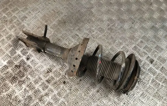 Subaru Legacy Front shock absorber with coil spring