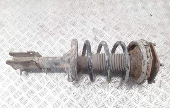 KIA Carnival Front shock absorber with coil spring