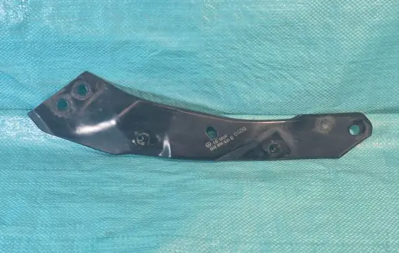 Radiator support slam panel bracket