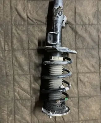 Land Rover Evoque I Front shock absorber with coil spring GJ3218K001AA