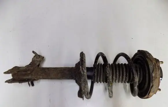 Nissan X-Trail T30 Front shock absorber with coil spring 789423jklweu