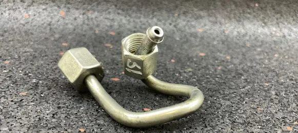 Fuel injector supply line/pipe