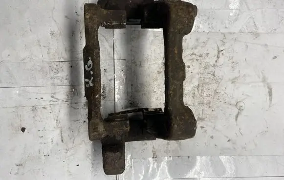 Volkswagen Touran I Brake caliper pad carrier rear 