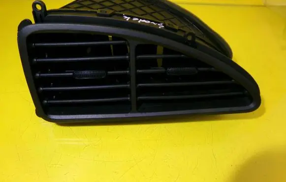 Hyundai Elantra Dash center air vent grill 97412-2D000