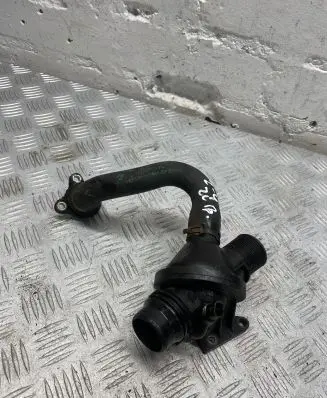 Thermostat/thermostat housing