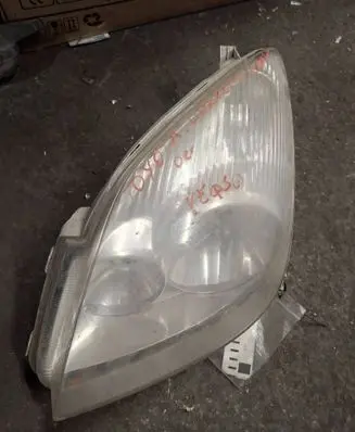Toyota Corolla Verso E121 Headlight/headlamp 9922679004