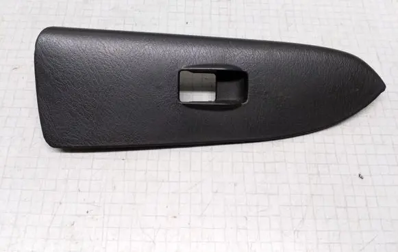 Mazda 626 Front door window switch trim 