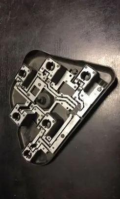 Tail light bulb cover holder