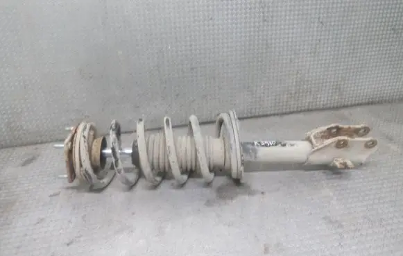Front shock absorber with coil spring