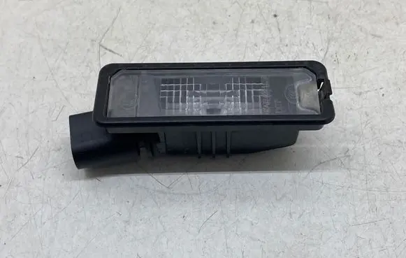 Volkswagen Caddy Number plate light 1K8943021