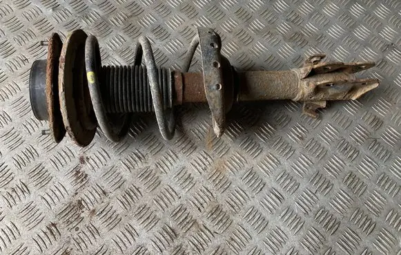 Front shock absorber with coil spring