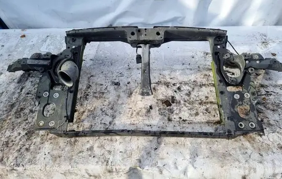 Radiator support slam panel