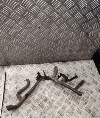 Volkswagen Golf IV Engine coolant pipe/hose 038121065