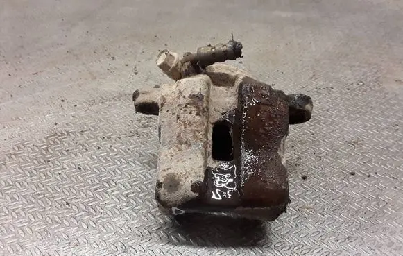Suzuki Grand Vitara I Front brake caliper 