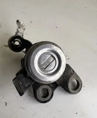 Toyota Yaris Coupe door lock (next to the handle) 