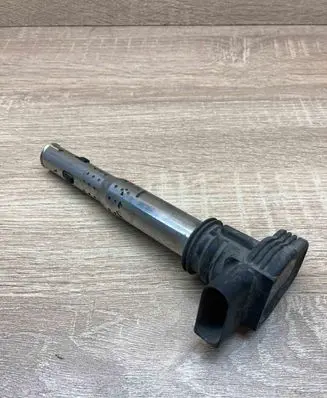 Volkswagen Golf V High voltage ignition coil 07K905715F