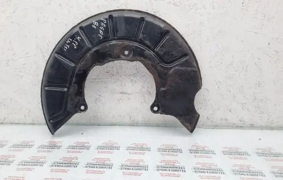 Volkswagen PASSAT B6 Front brake disc dust cover plate 1K0615311F
