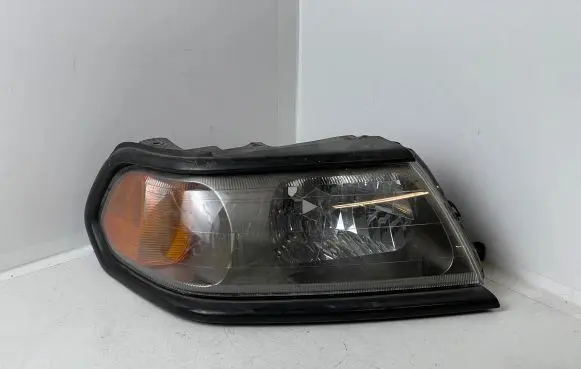 Mitsubishi Pajero Sport I Headlight/headlamp 10087415