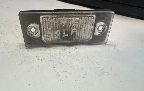 Volkswagen Golf IV Number plate light 1J5943021