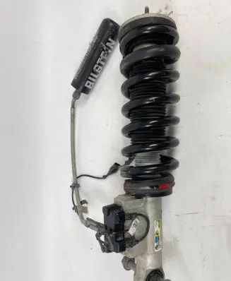 Ram 1500 Front shock absorber with coil spring 68432490AC