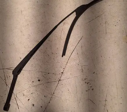 Front wiper blade arm