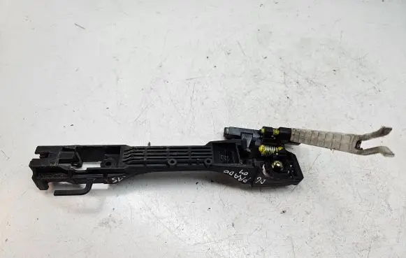 Rear door exterior handle/bracket
