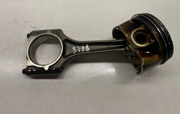 Piston with connecting rod