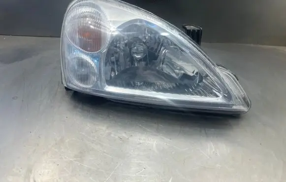 Suzuki Liana Headlight/headlamp 10032662