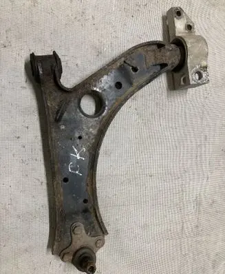 Volkswagen Caddy Front lower control arm/wishbone 1K0407189E